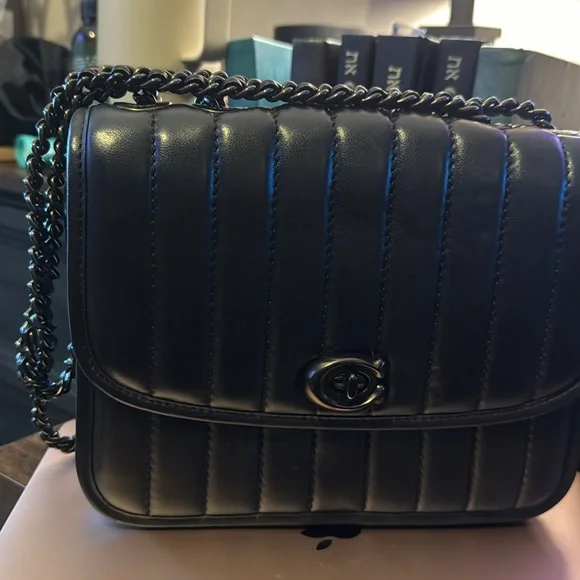 Coach - Picture 2 of 3